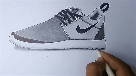 drawing Nike shoes on paper